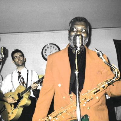 1999, 31st. October, Germany, Wesel ,Big Jay McNeely and me ( a gig with the Casters), singing into a Shure 55A from the 1940ies. It sure fits good!